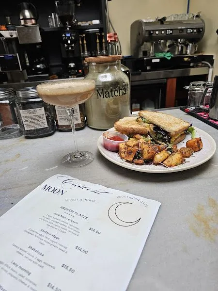 Menu with espresso martini and brunch plate
